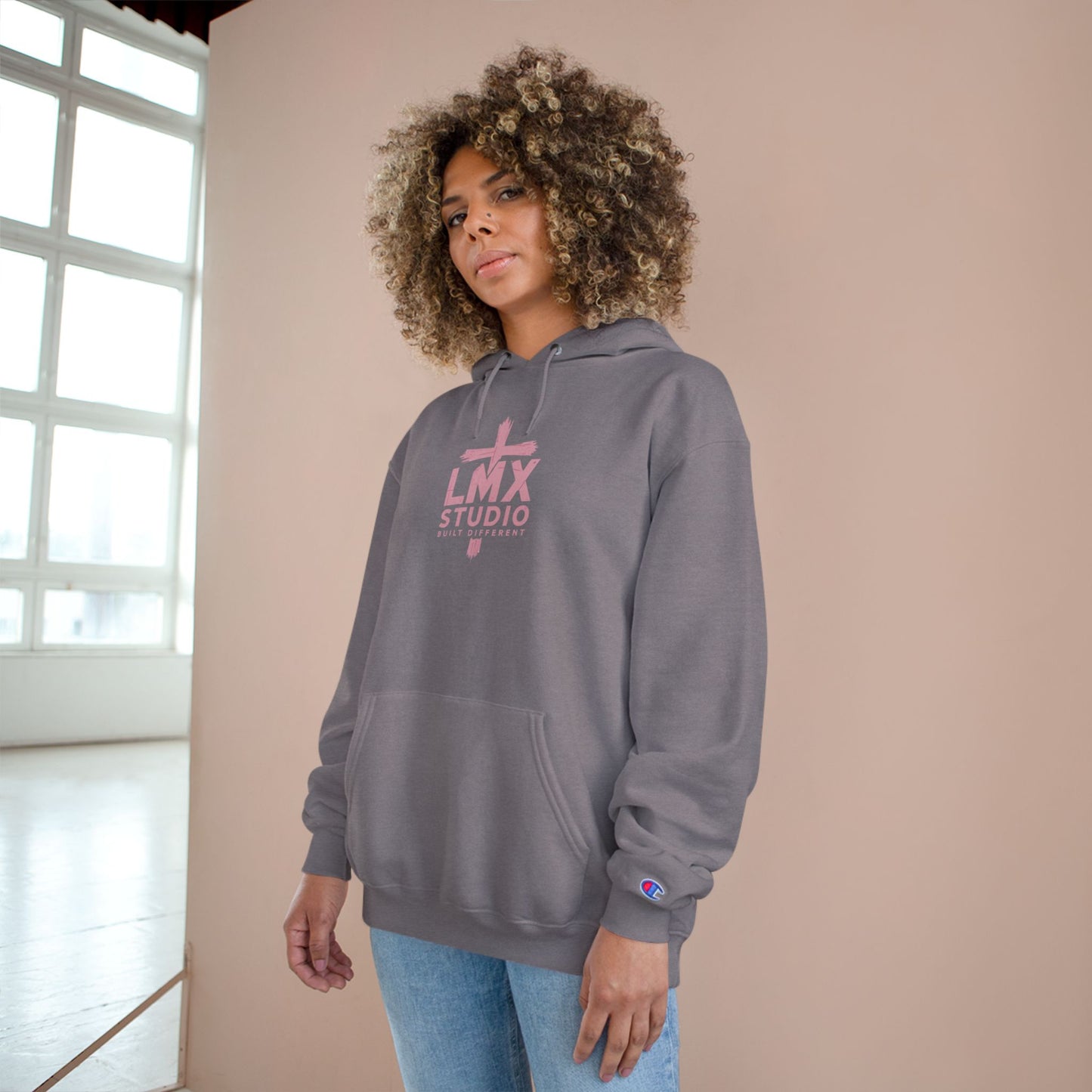 LMX Studio Women’s Champion Hoodie – Premium Streetwear with Distressed Pink Cross Logo