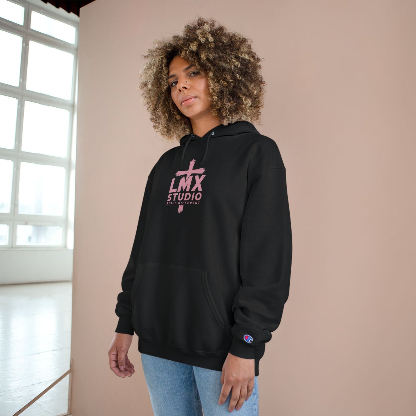 LMX Studio Women’s Champion Hoodie – Premium Streetwear with Distressed Pink Cross Logo